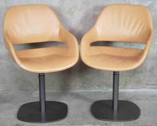 014  Lot 486  Pair of Zanotta Italian leather swivel chairs