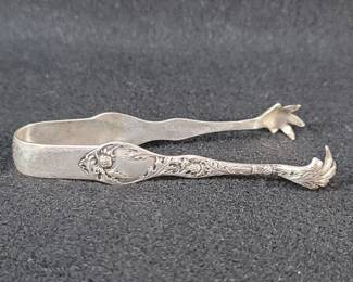 182  Lot 116  Sterling silver sugar tongs