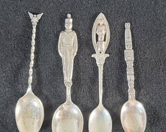 183  Lot 117  Four sterling silver souvenir spoons