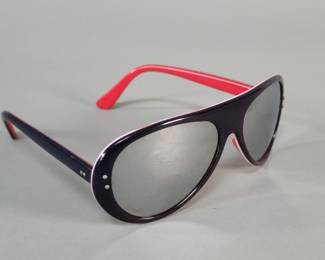 382  Lot 129  Vintage 1970s red, white and blue mirror