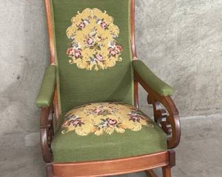 548  Lot 187  Victorian carved mahogany rocking chair with