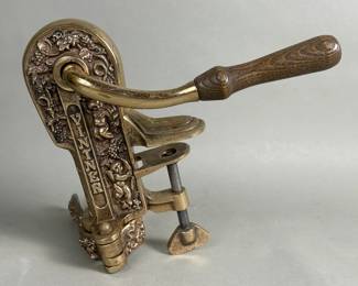 676  Lot 543  Vintner brass table mount corkscrew