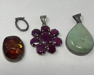 127  Lot 33  Group of amber, turquoise and quartz pendants