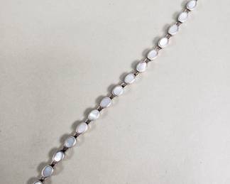 212  Lot 675  Sterling silver marcasite and moonstone bracelet