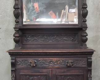 031  Lot 139  Antique hand carved oak sideboard with beveled