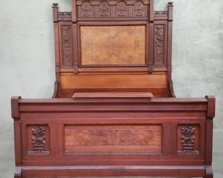 535  Lot 133  Victorian carved walnut bed