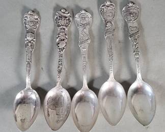 184  Lot 118  Five sterling silver souvenir spoons