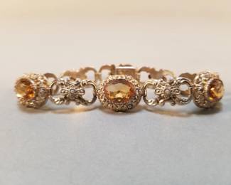 335  Lot 693  Vintage silver and citrine gemstone bracelet