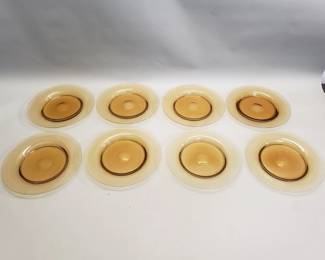 283  Lot 82  Eight Midcentury Modern amber glass