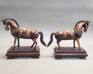 699  Lot 629  Pair of composite horse figurines