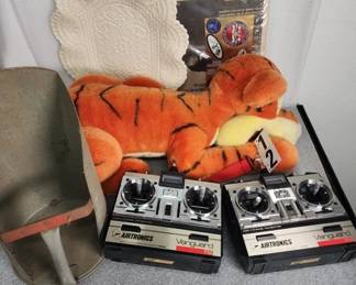 799  Lot 321h  Airtronics controllers, Disney Tigger plush,