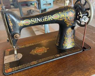 Lot #201- Singer Treadle Sewing Machine with Ornate Cabinet