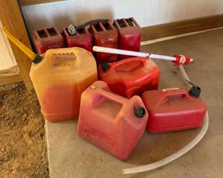 Lot #222- Fuel Can Assortment with Manual Transfer Pump