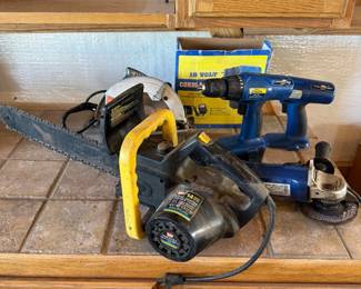 Lot #212- Power Tool Group with Cordless Drills, Circular Saw, Chainsaw & Grinder
