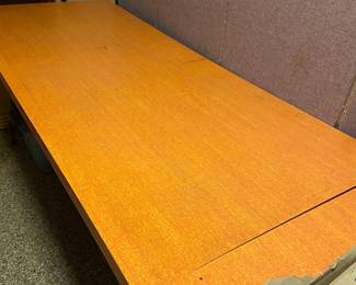 Banquet size tables, orange formica tops