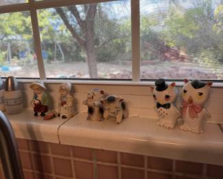 **Vintage Salt & Pepper Shaker Collection β Charming & Collectible!** An assortment of vintage salt and pepper shaker sets featuring adorable animals, Dutch boy-and-girl figurines, owls, and other whimsical designs. Full of nostalgic charm and personality! Perfect for collectors, vintage kitchen decor, or anyone who loves unique little treasures. Sold individually by the pair.