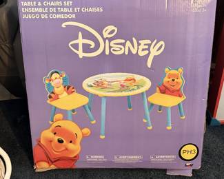 🍯🐻 **Oh, Bother! Look What We Found!** This adorable Disney Winnie the Pooh children's table and chairs set is still in its original box! Perfect for a playroom, grandkids' house, or daycare, and an especially sweet find for Disney lovers. 💛 With Christmas right around the corner, wouldn't this make the cutest gift?! 🎄🎁 *Contents and completeness have not been verified. Sold as-is.*