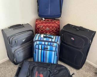 SW254Assorted Rolling Softside Suitcases