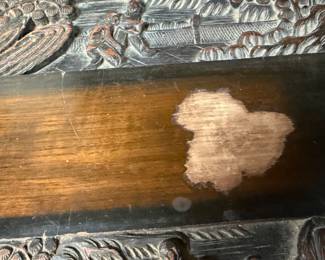 No damage to the wood, just needs a finish repair!