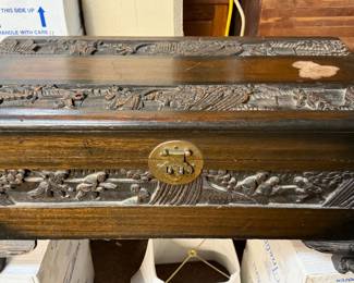 This is a hand Carved Oriental Camphor Wood Chest