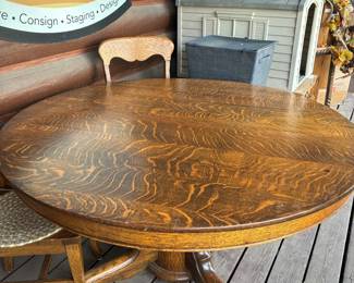 51 inch Zebra Oak table with 6 chair and 2 leaves. $150