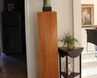 Sculpture and Triangular Table