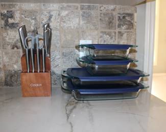 Knives and Pyrex with lids