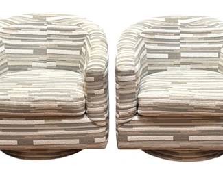 A Pair of Modern Swivel Barrel Chairs