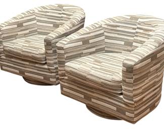 A Pair of Modern Swivel Barrel Chairs
