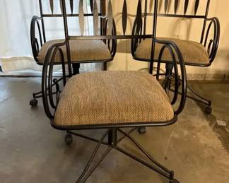 Three Metal Chairs with Casters