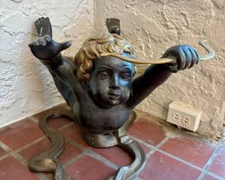 Pair of bronze putti side table bases