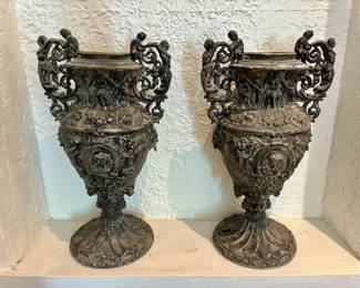 Pair of iron urns