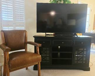 Several TVs and Storage Cabinets