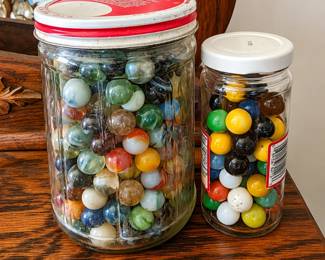 Vintage Marble Jars on a Wooden Dresser