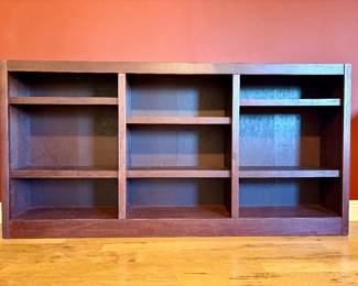 Cherry stained horizontal bookcase with adjustable shelves. Measurements: W - 72" / D - 10.75" / H - 36"