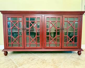 Distressed red Chippendale style accent cabinet. Measurements: W - 72" / D - 17.5" / H - 39.25"