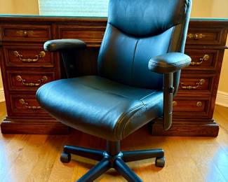 Black upholstered office chair.
