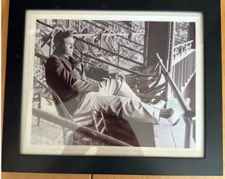 Lot 15: Black and White Photograph of Clark Gable reclining in a chair