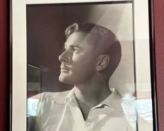 Lot 42: Framed photograph of Errol Flynn