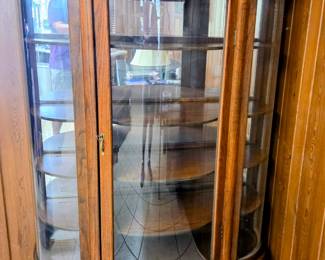 Large bowfront curio cabinet