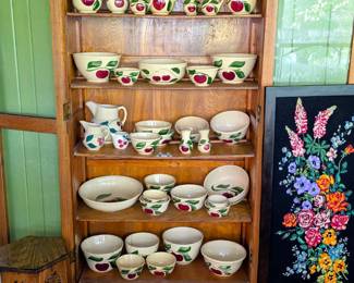 Watt pottery collection and needlepoint fire screen