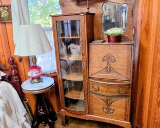 Secretary with drop front desk and attached curio cabinet