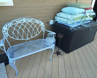 Iron patio seat, deck storage box and cushions.