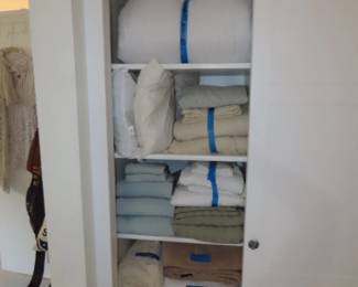Linens, blankets, comforters and pillows.