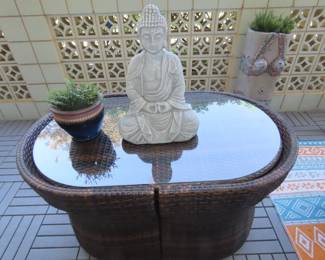 Patio table and two hidden chairs.
