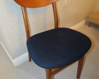MCM dining table and four chairs.
