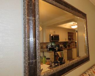 Largeframed mirror.