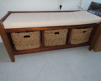 Bench seat with basket storage.