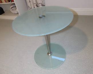 Glass and chrome pedestal end table.