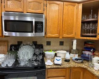 Glass drink ware, salad spinner, mandolin, stock pot, B&D food processor, glass food storage w/lids, wine & brandy glasses